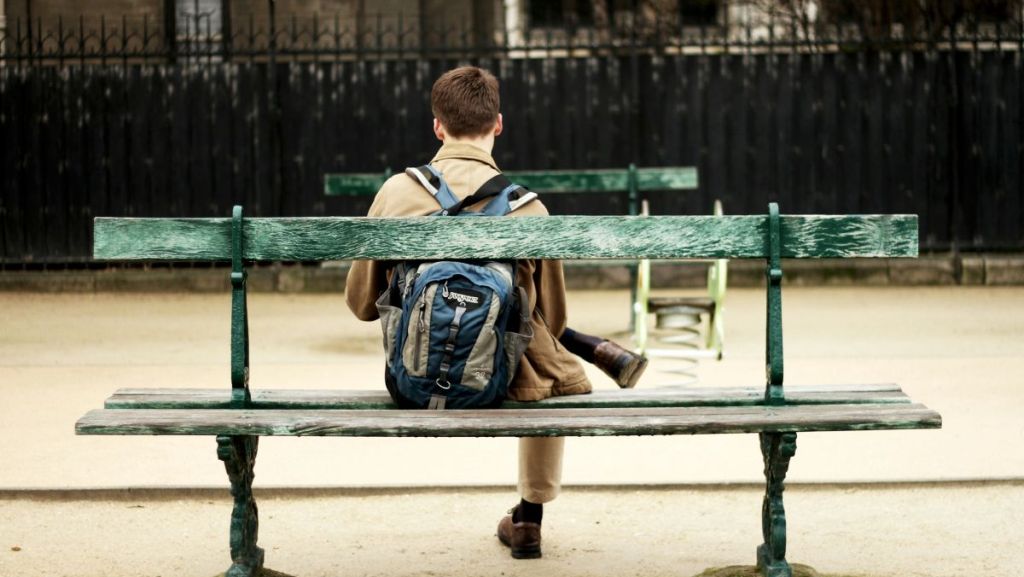 Person sitting on a bench